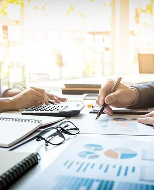business-man-financial-inspector-and-secretary-making-report-calculating-or-checking-balan