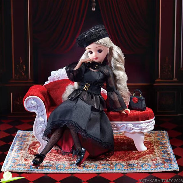 Licca-chan in a black Gothic Noir outfit with lace beret and corset belt, seated on a Gothic sofa with her hand on her cheek.