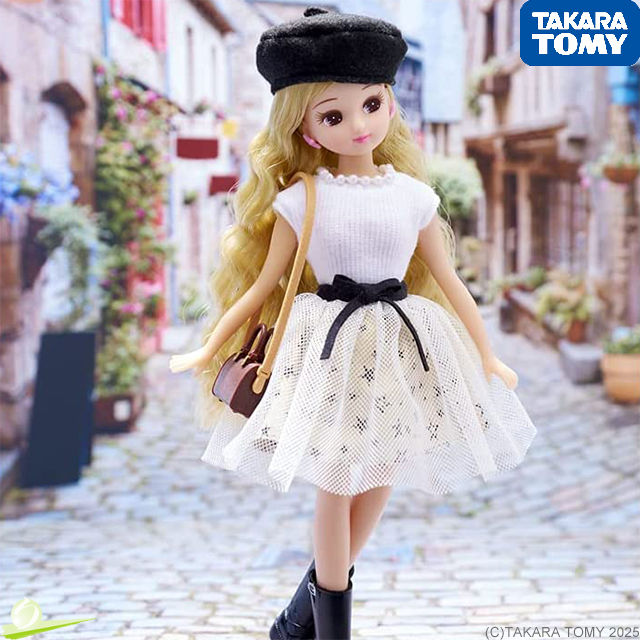Angled front view of Licca LD-17 Mouton Mix Doll with Boston mini shoulder bag, posed before a cobblestone street diorama BG.