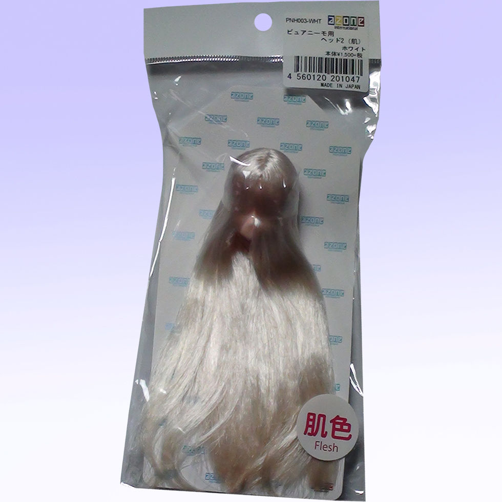 Photo of Azone PNH003-WHT flocked head parts for 1/6 Pure Neemo dolls, white hair, packaged in a clear plastic bag.