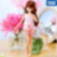 Front full-body view of Photogenic Licca Nerine doll in pink roomwear, one hand near mouth, with vanity background.