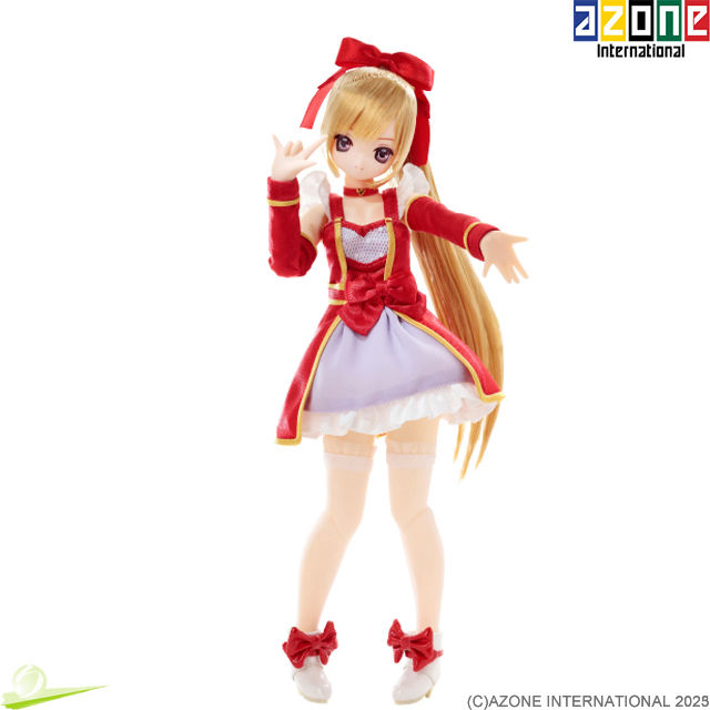 Miniatura: Full-body front view of Azone Magical Aika doll striking a cute dance pose, one palm extended forward,  set against white BG.