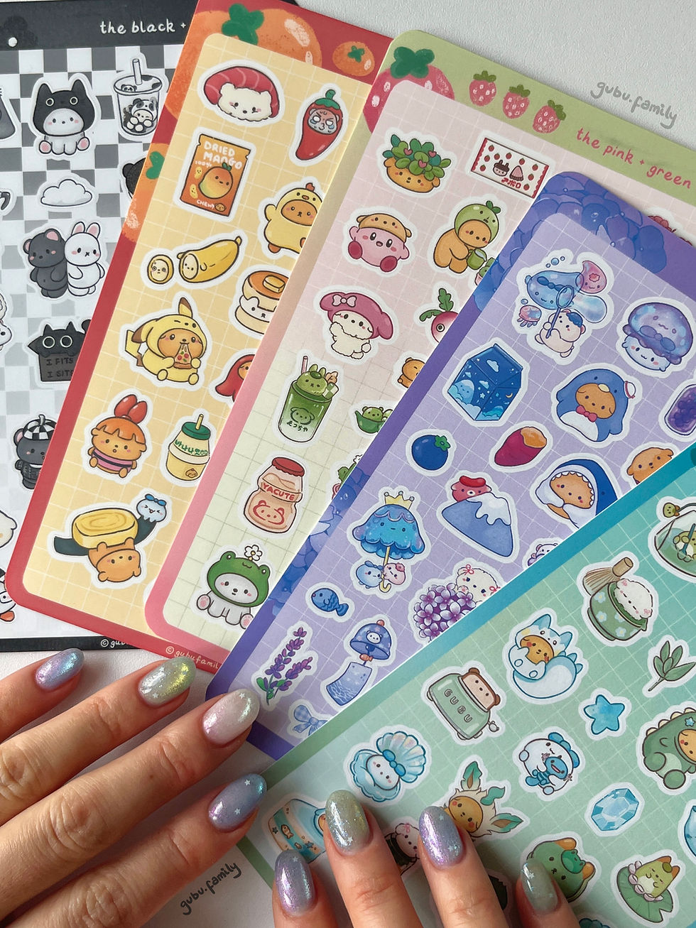 five pastel-themed waterproof vinyl sticker sheets with kawaii-style illustrations