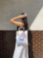 White canvas tote bag with vibrant kawaii character illustration, pastel cyber-pop aesthetic design, reusable shoulder bag