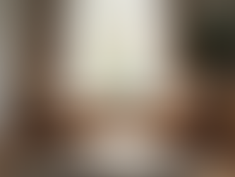 Eye-level view of a cozy living room with two chairs facing each other