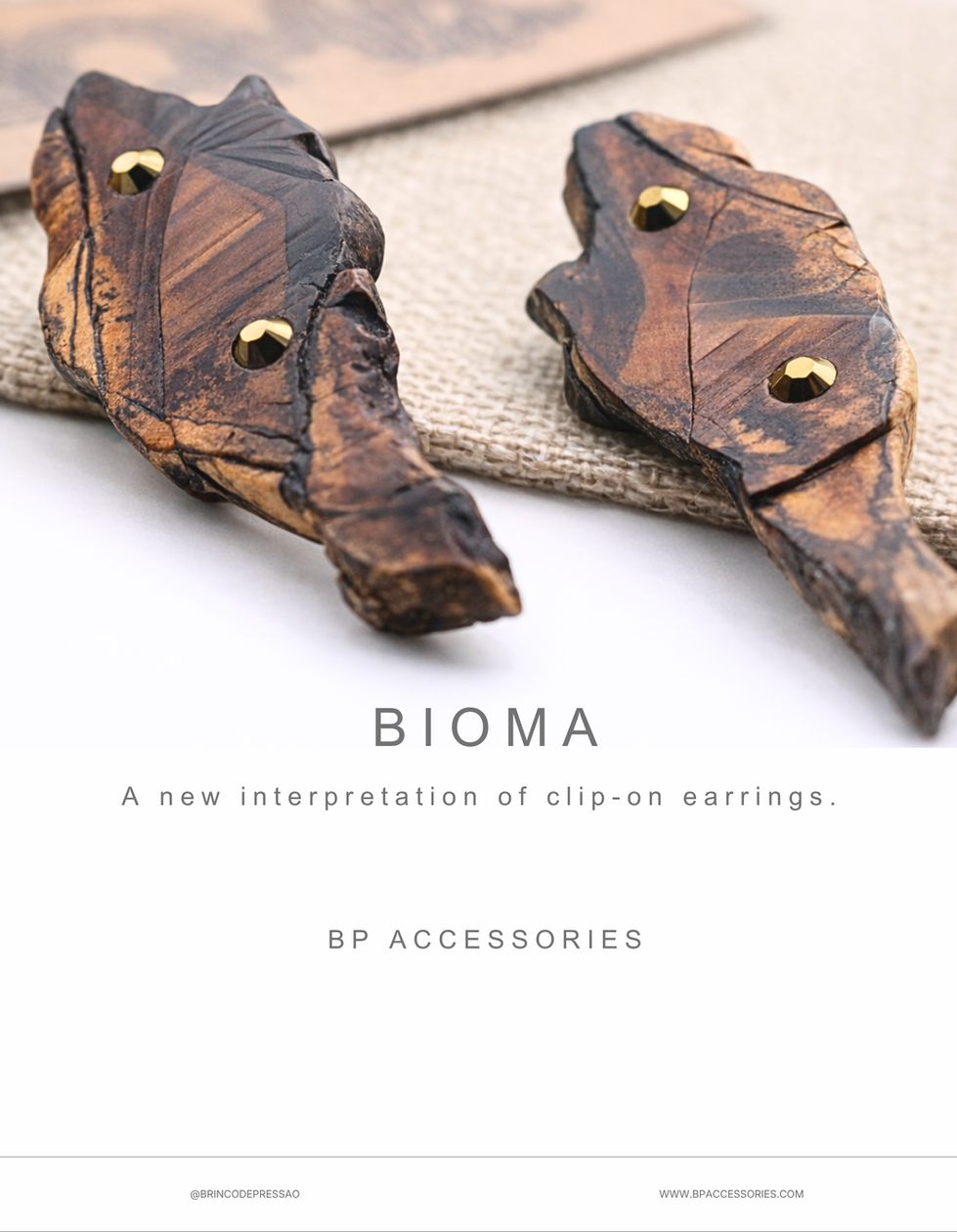 Handcrafted clip-on earrings made from reclaimed Brazilian wood, featuring natural grain textures and a contemporary minimalist design.