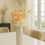 Thumbnail: Light Orange Roses Arrangement in a tall vase