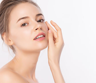 Beautiful Young Woman touching her clean