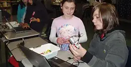 Charter school students participate in Lego robots workshop