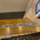 Thumbnail: Very long gilded glass Victorian shop sign