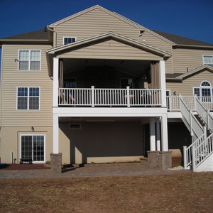 A-Frame Roof Deck with Stone Wrapped Columns & Patio