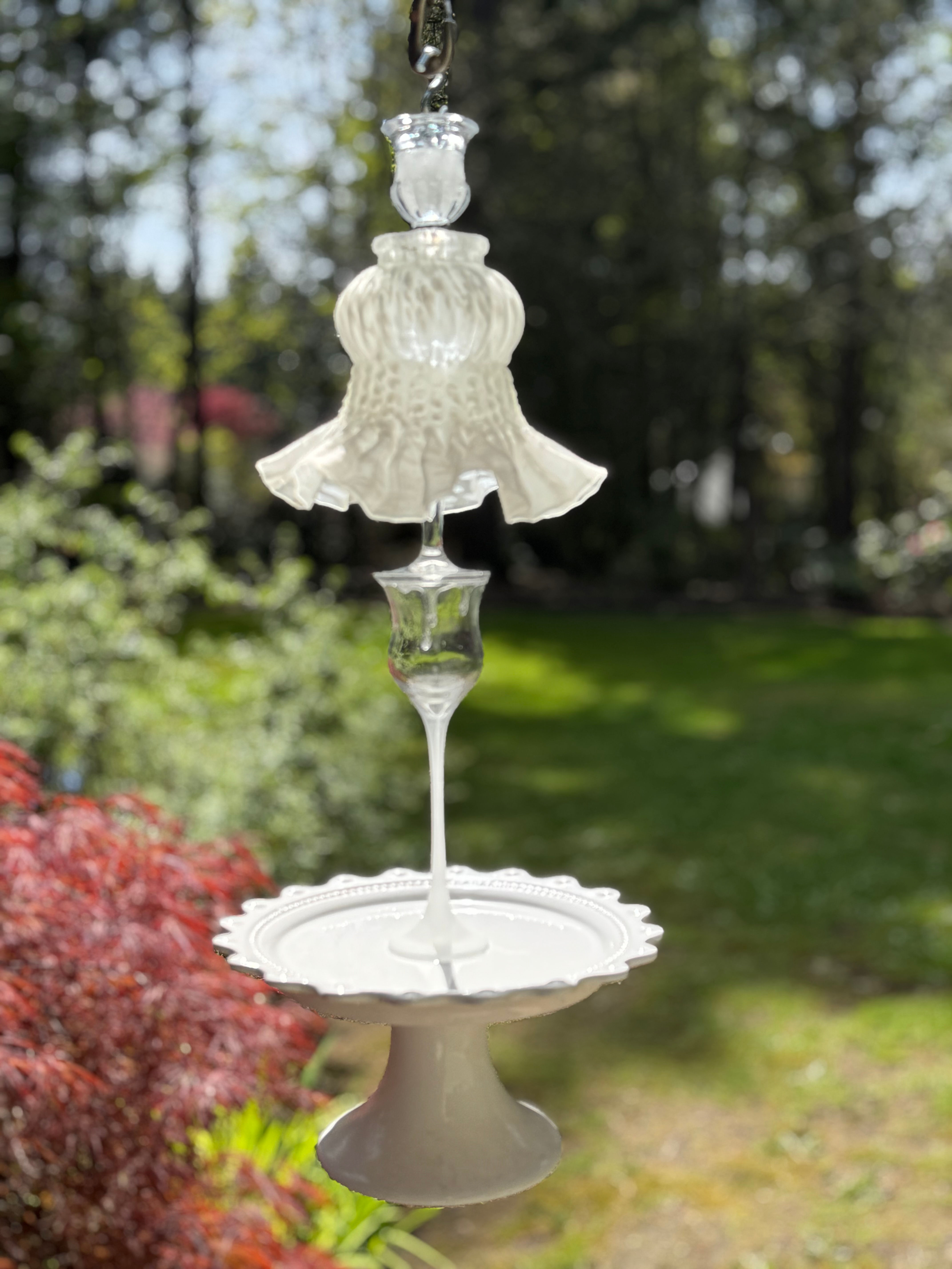 Hanging ivory glass and ruffled ceramic garden ornament