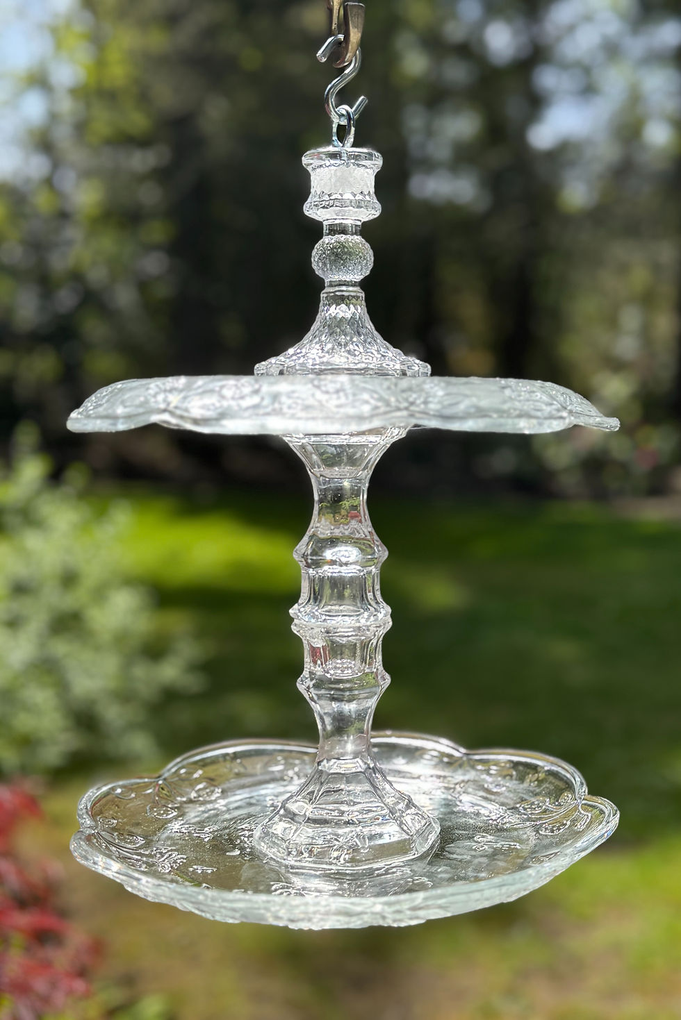 Lacy glass bird feeder