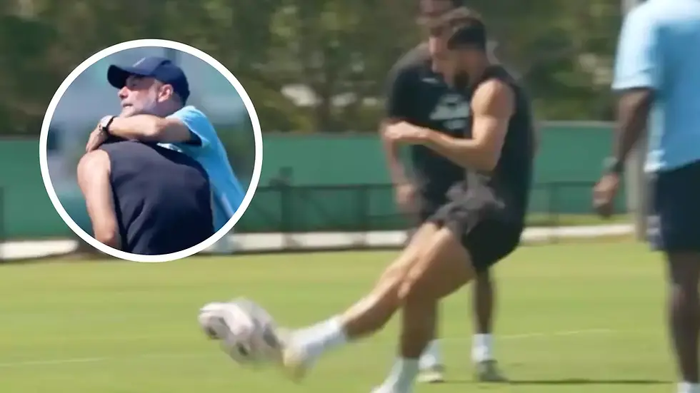 Pep Guardiola hugs Rayan Cherki after the latter scored a world-class goal in training.