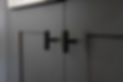 Black cabinet pulls on dark gray cabinets