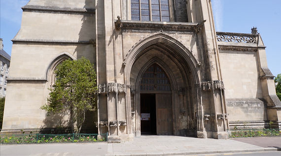 Close-up on the church's entrance, where the porch-tower visibly leans