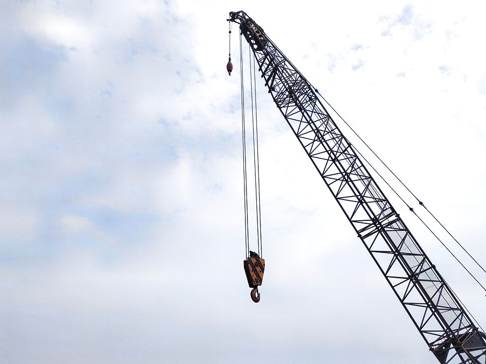 A boom or lattice boom and hook on a crawler crane, also known as a lattice boom crane Cra