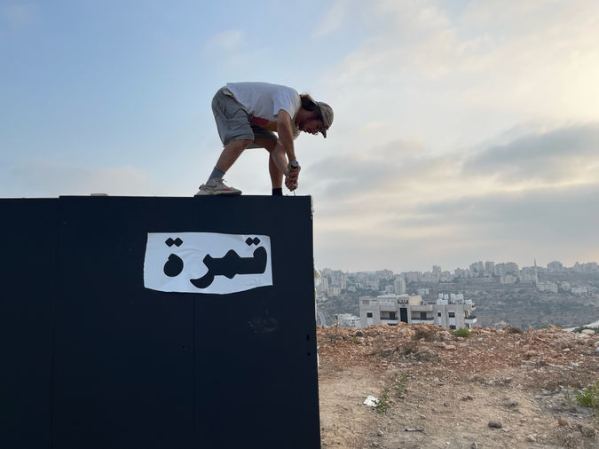 Sari Tarazi, the second leading artist of the Qumra Installation, a professional photographer and co-leader of the Darkroom space in Ramallah