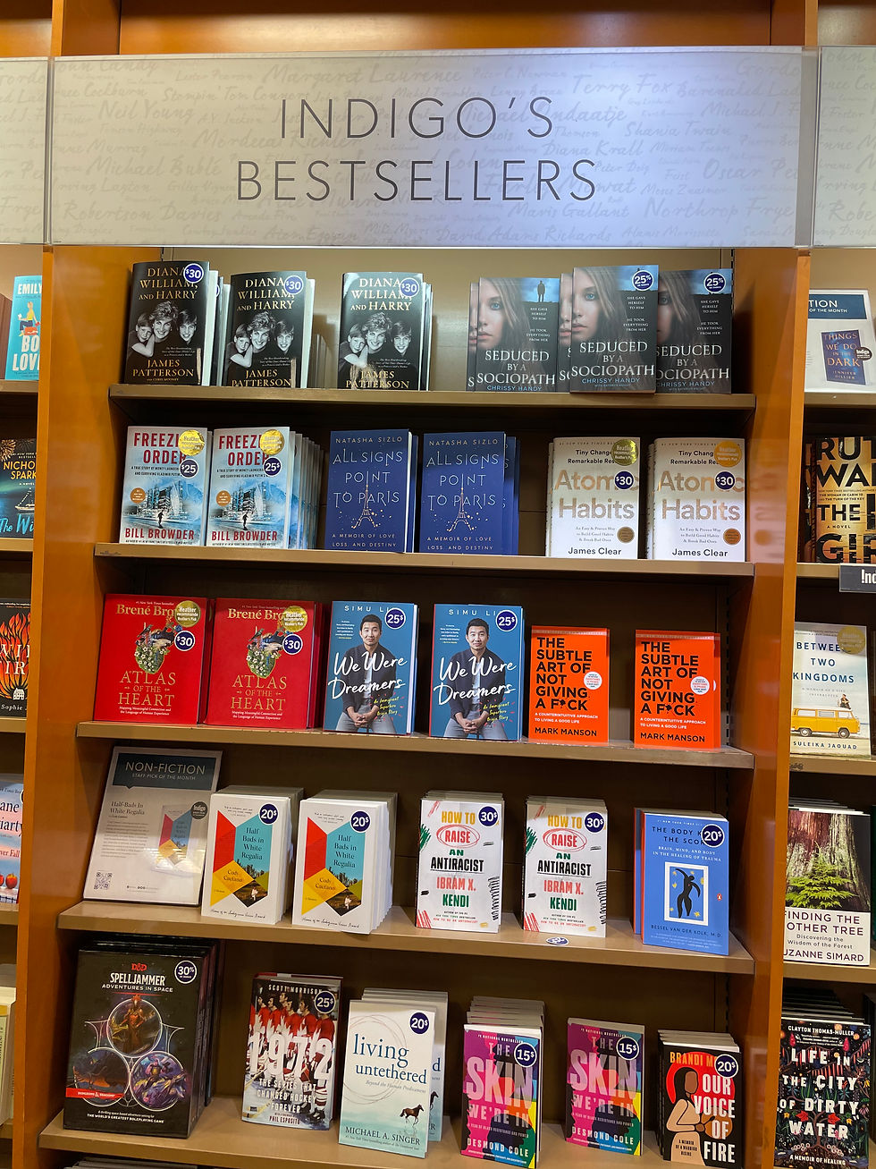 Indigo's Bestsellers book wall at Indigo in Montreal, Canada