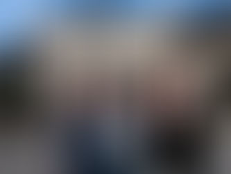 3 women stand in front of the Treatment & Recovery Center.