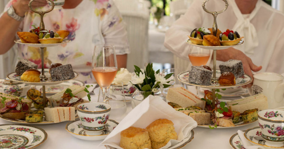 afternoon tea with pastries and wine