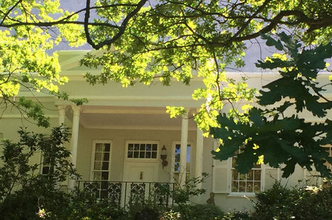 building with trees in foreground