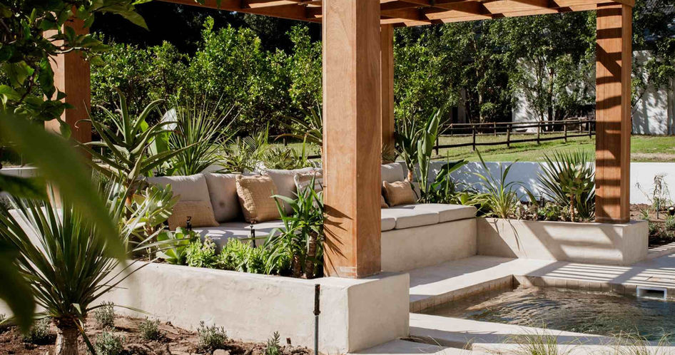 outdoor seating area with plants