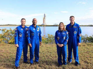 From left to right, Artemis II NASA astronauts Reid Wiseman, commander; Victor Glover, pilot, and Christina Koch, mission specialist, and CSA (Canadian Space Agency) Jeremy Hansen, mission specialist, pose for a photograph during rollout of NASA’s Artemis II SLS (Space Launch System) rocket and Orion spacecraft to Launch Complex 39B at NASA’s Kennedy Space Center in Florida on Saturday, Jan. 17, 2026.