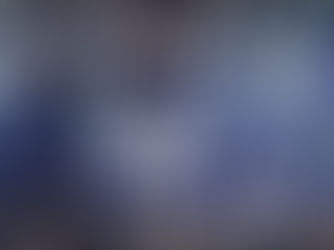 Band performing on stage with purple lighting and fog. Banner reads "Daytona." Crowd watching. Energetic atmosphere.