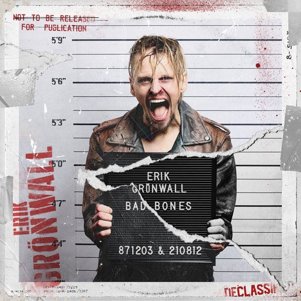 Man in leather jacket screams, holding a sign with "Erik Grönwall Bad Bones." Mugshot backdrop, torn paper effect, height markers visible.