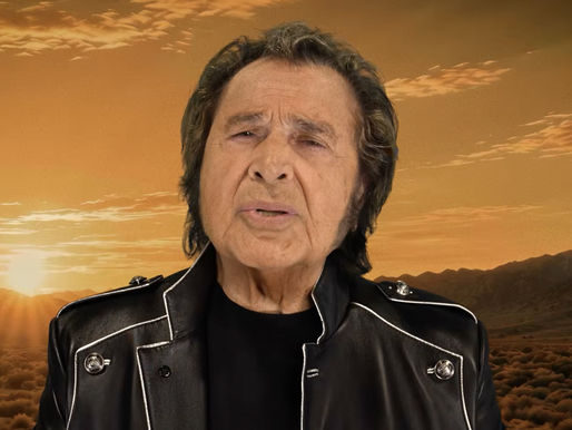 Engelbert Humperdinck on a motorcycle on a desert road at sunset, with gold text Engelbert Humperdinck and Faithfully