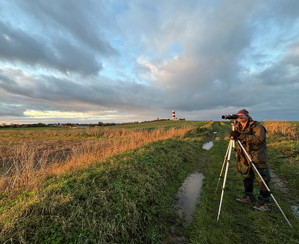 Phil Heath enjoying the RLB. Happisburgh Lighthouse can be seen in the background