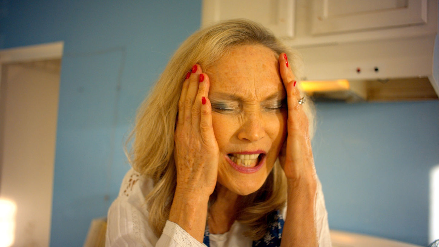 Delilah_hands_to_face.jpeg