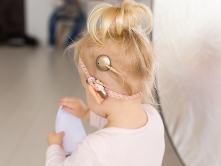 A little girl with chochlear implants