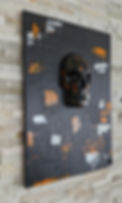 Tableau Gold Tooth avec crâne en relief sur fond noir
