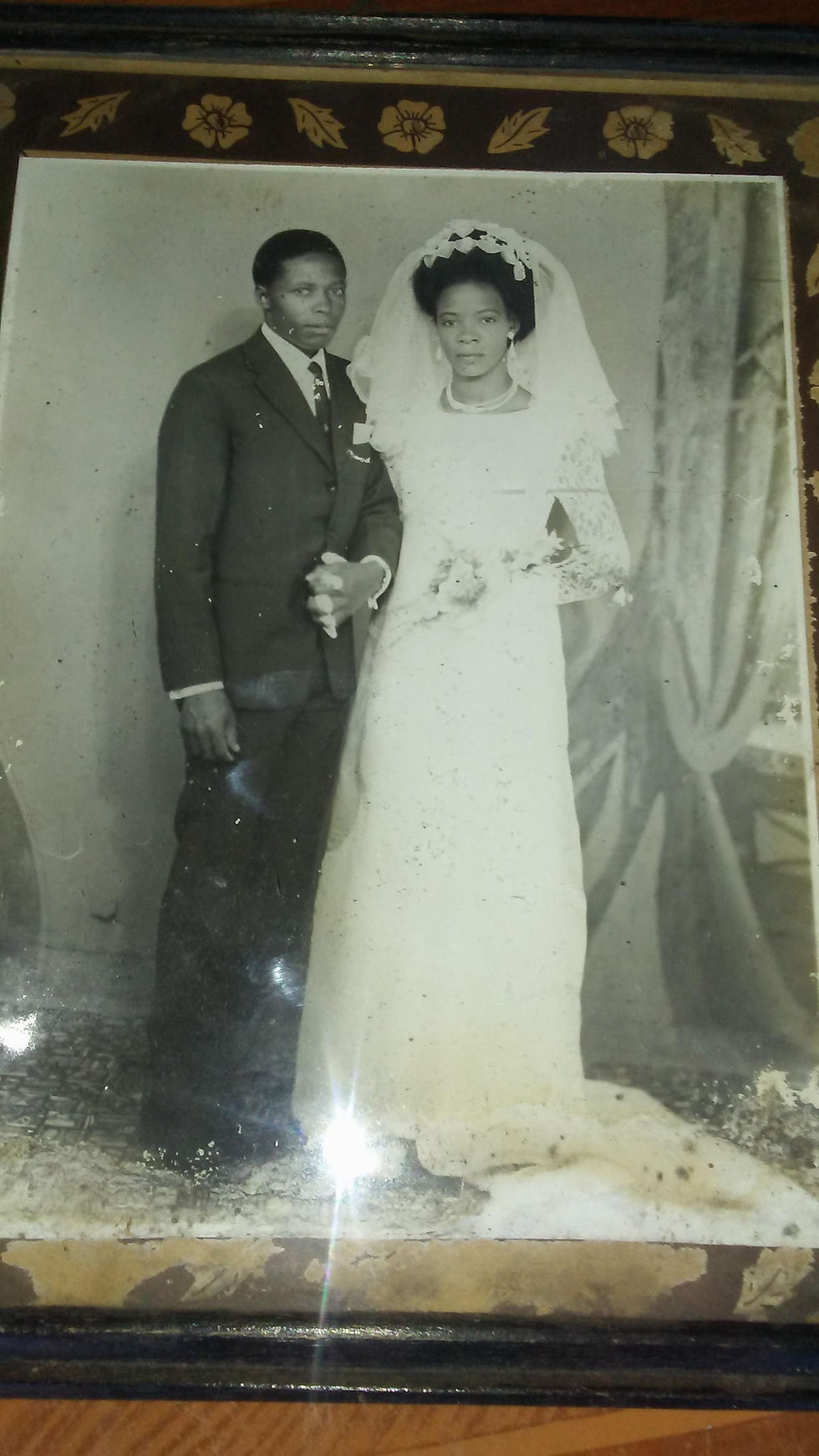 Yasin Kakande's Father and Mother on their wedding day. My Father Taught Me to Cry