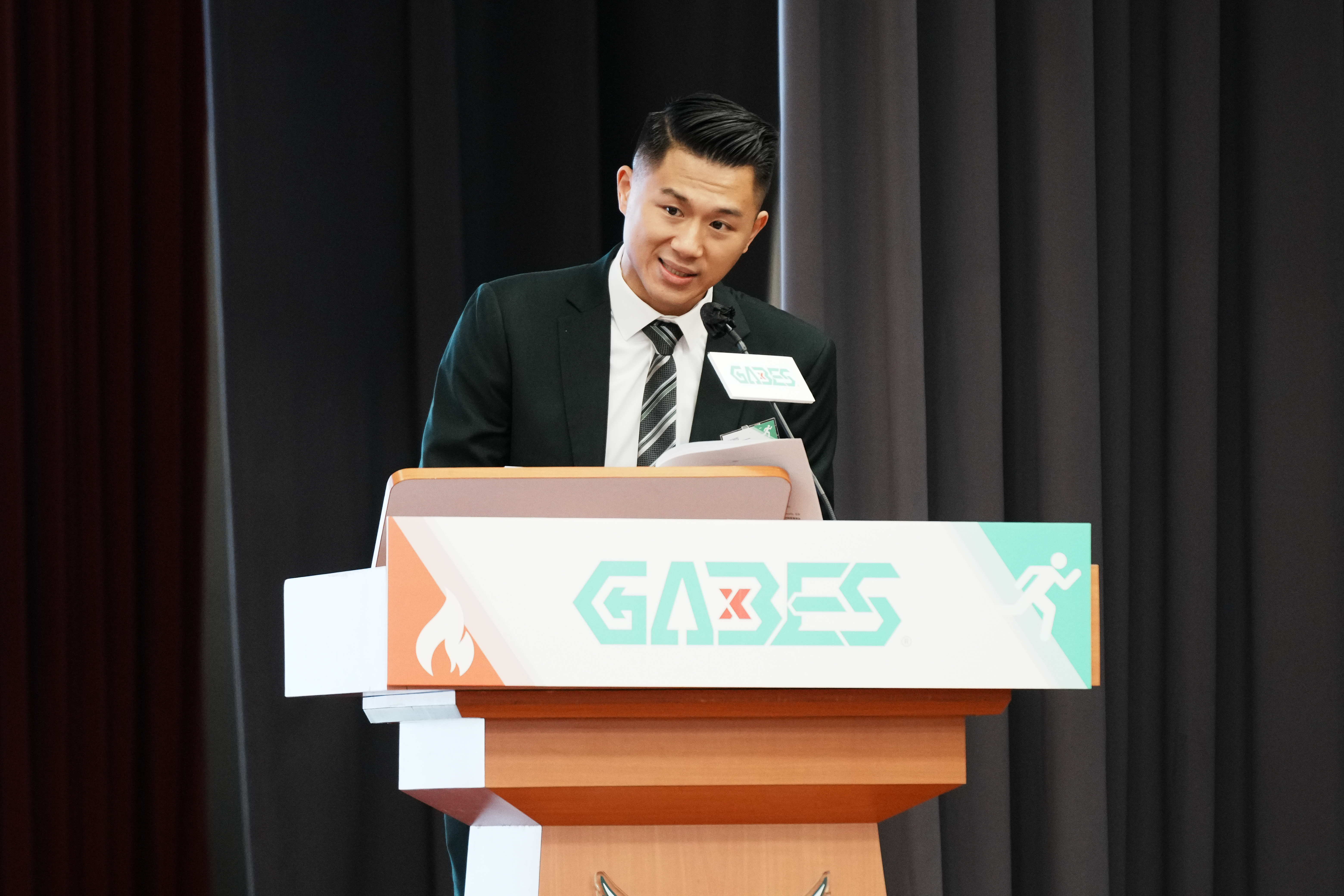 Deacon speaking at a GABES event