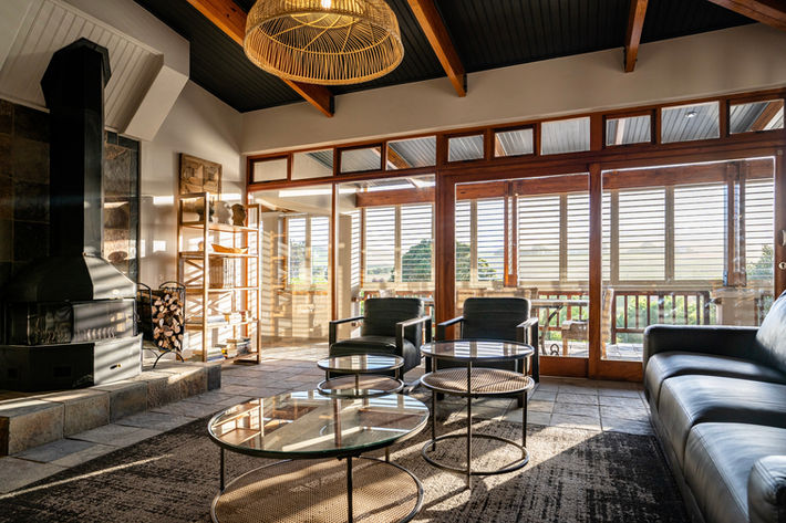 Stunning interior and real-estate photography captured on a scenic farm in Stellenbosch. The images showcase breathtaking views of Stellenbosch and Devon Valley, making it an ideal destination for weddings and vacations. The property features a picturesque pool, a charming fireplace, and a pizza oven, creating a perfect ambiance for relaxation. Our exceptional real-estate and interior videography effectively promotes this vacation rental, driving remarkable engagement.