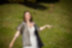 Petra dancing in nature during breathwork session