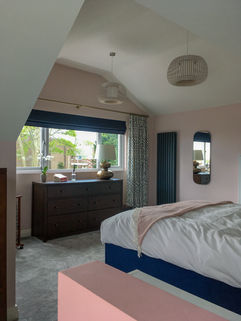 Loft bedroom with landscape window