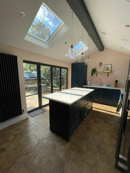 Kitchen extension with bifold doors and roof lights