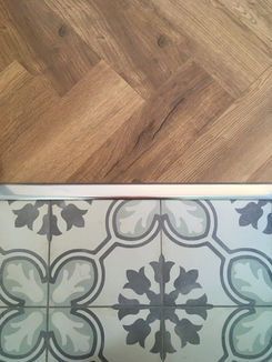 Wooden floor meets tiled floor
