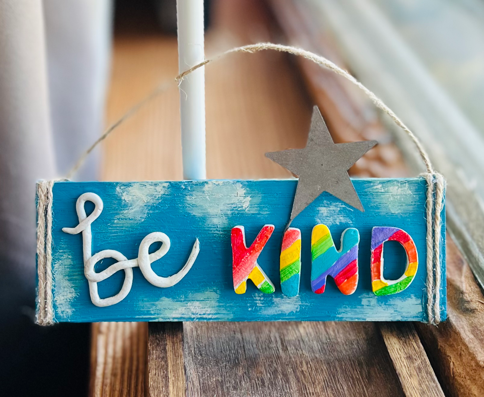 Wood Sign with Clay Letters “Be Kind”