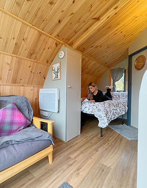 Clan Pods single self-catering pod with woman