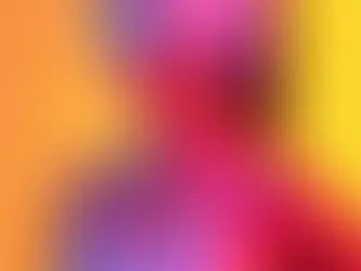 Woman wearing BrainTap headset, looking calm. Background is a vibrant gradient of yellow and orange. She's in a white tank top. BrainTap San Antonio