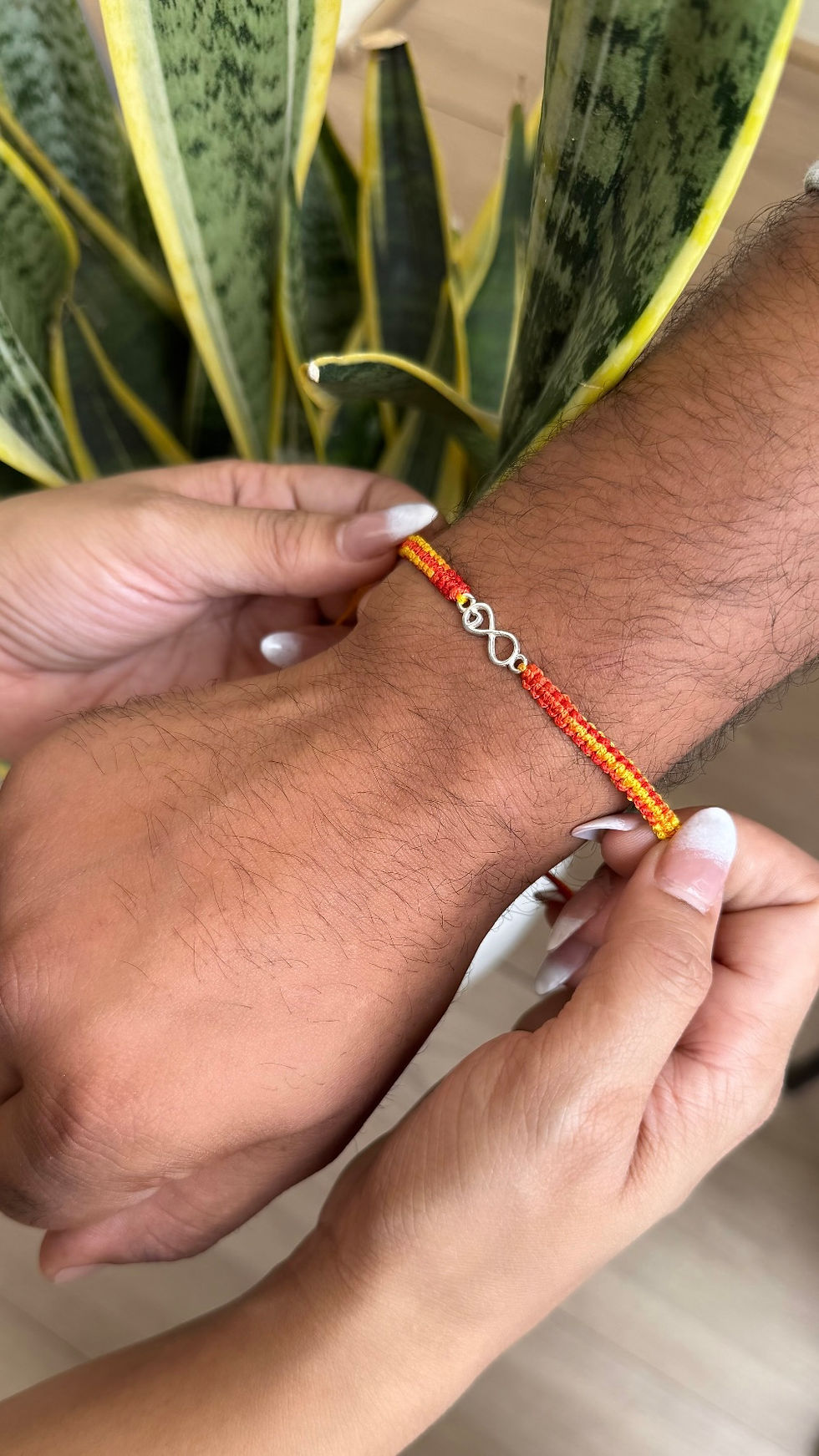 Silver Infinity Band Rakhi with Adjustable Cord