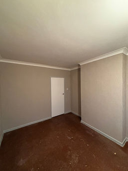 Empty room that has been freshly wallpapered