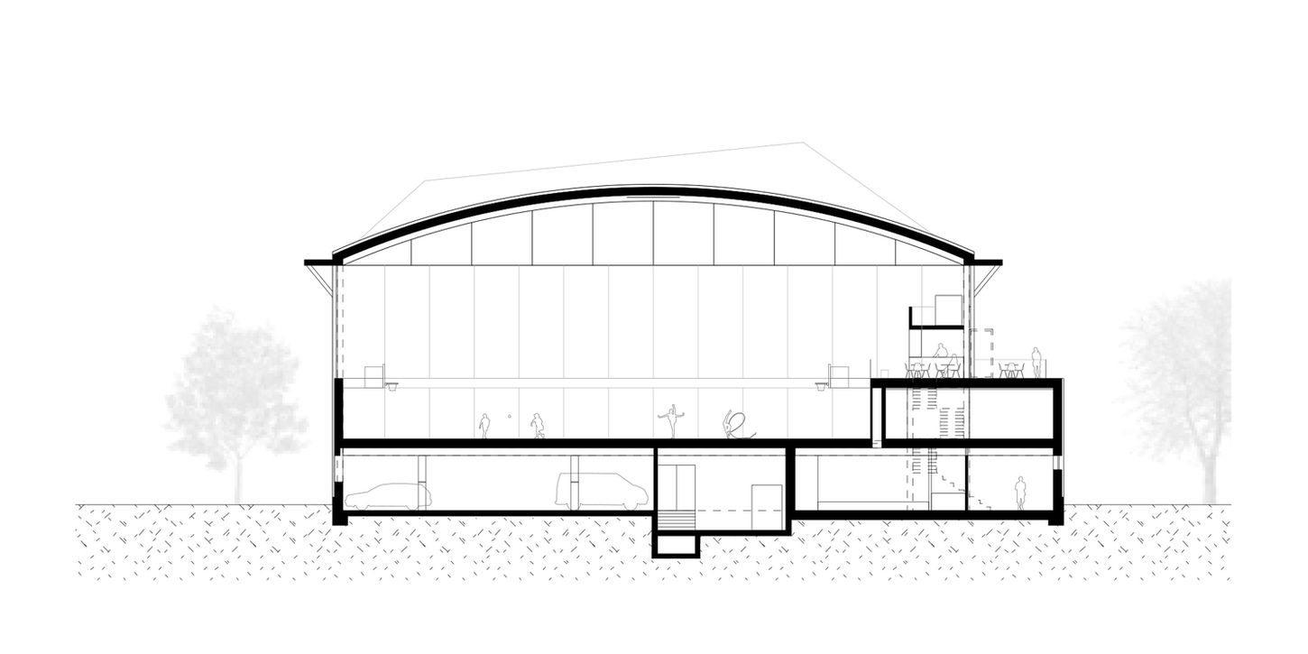 Querschnitt Doppelturnhalle mit Rundbogenträgern.