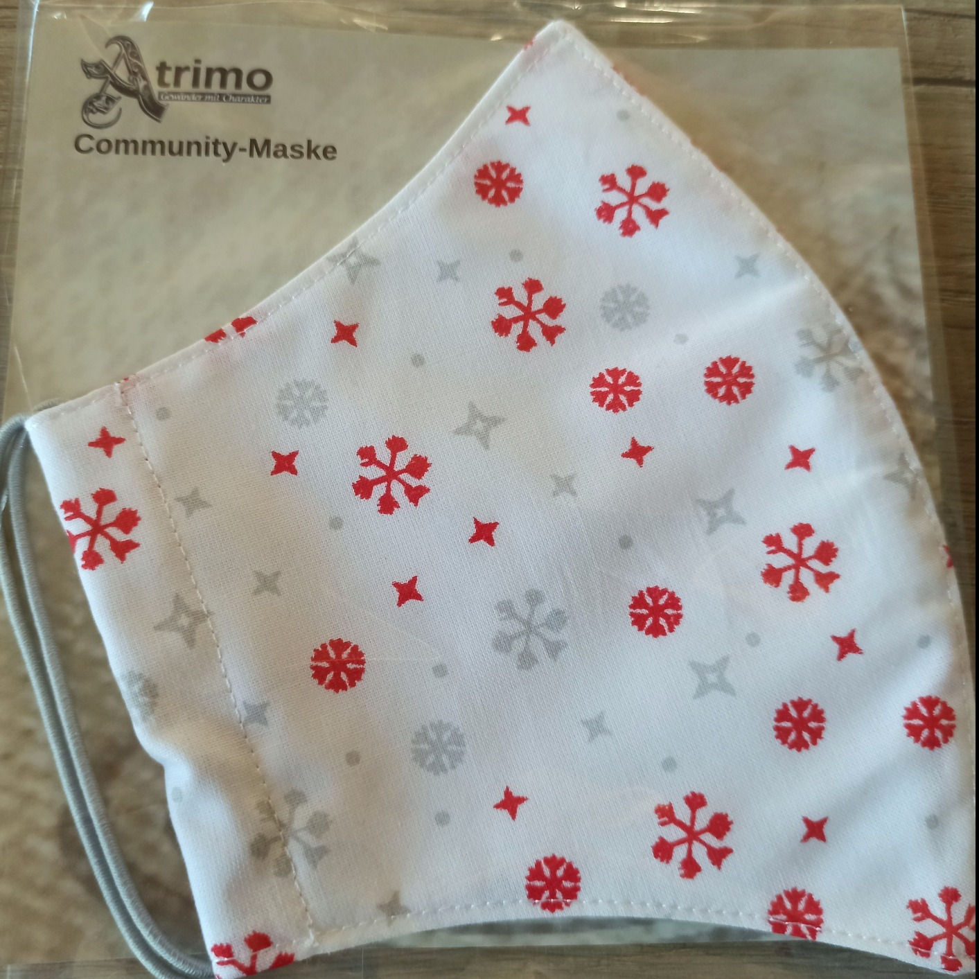 Community Maske "Schneeflocken, weiß/rot"