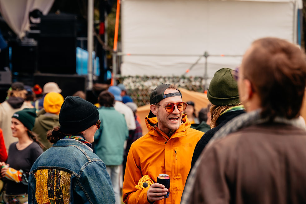 A group of young people having a drink at the 2023 Lochhart Music Festival